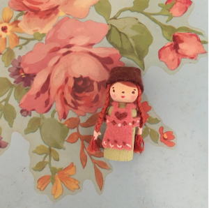 folky painted wooden peg doll