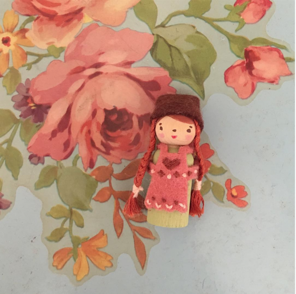 folky painted wooden peg doll