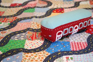 trolly, pattern in the book driving on a roadway quilt I made for my son